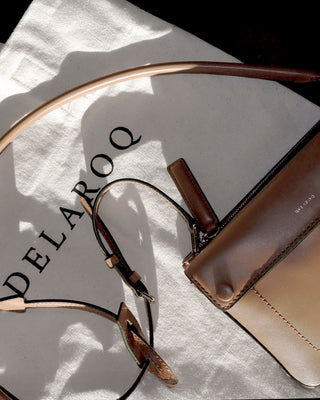 Delaroq handbag on a Delaroq cotton logo bag