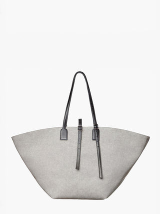 Gray tote bag with black handles and straps on a white background